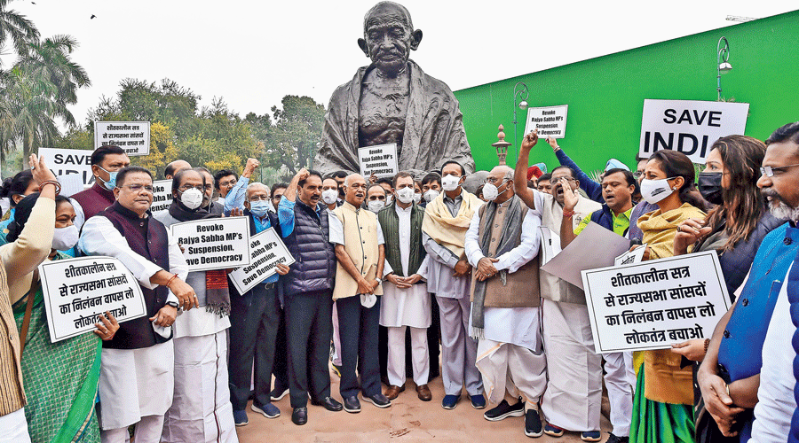 Congress MP Rahul Gandhi and other Opposition parliamentarians protest on December 1, 2021, the suspension of 12 Rajya Sabha MPs during the winter session of Parliament. Demonstrations, dharnas, fast and religious ceremonies will not be allowed in the precincts of Parliament House according to  a circular by the Rajya Sabha secretariat on Friday.