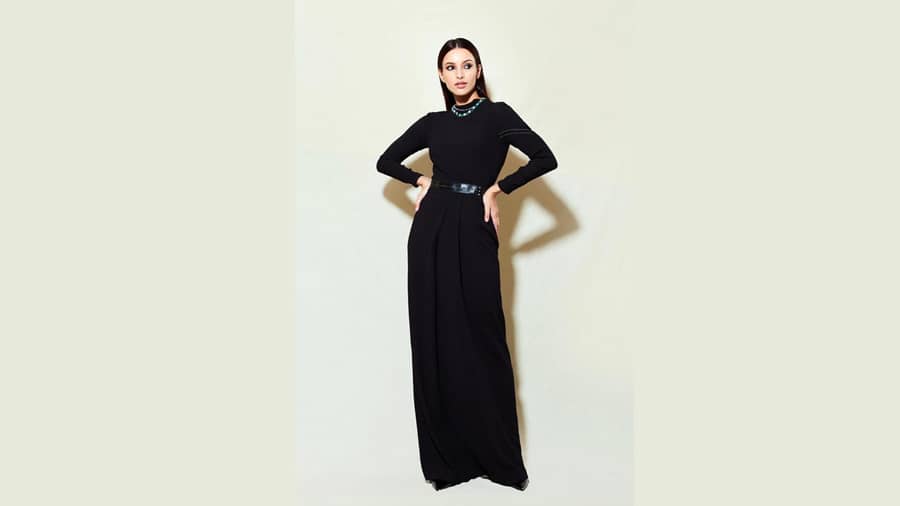  In a staple black Shantanu and Nikhil dress, paired with a shiny black belt, sleek middle-parted hair and a beady affair around her neck, Tripti shares pointers on how to look chic yet classy.