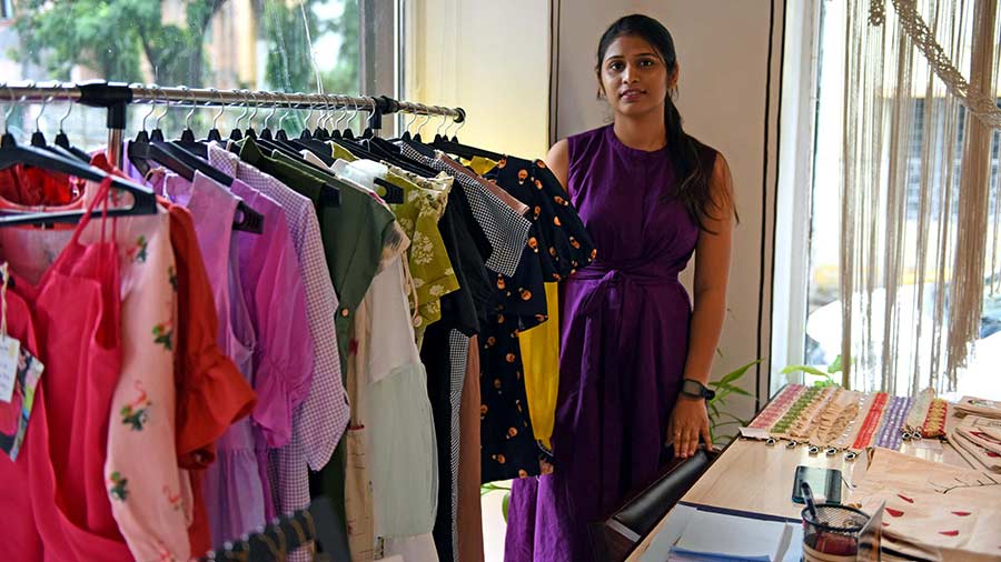 Priya buys the fabric, designs the dresses and places orders with karigars for her line of made-to-order clothes 