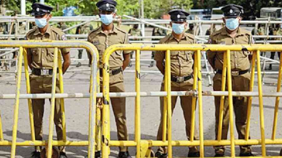 Security personnel outside the parliament building in Colombo.