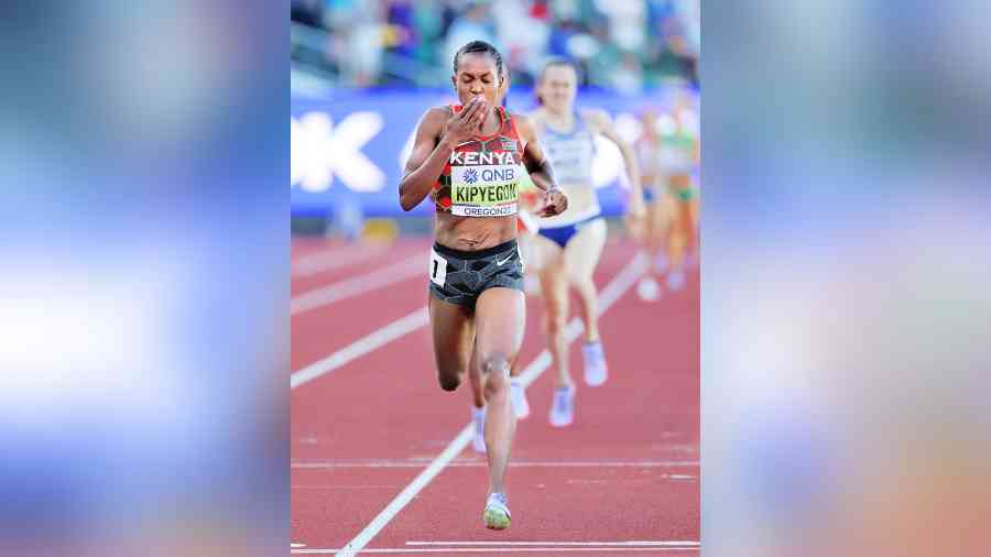 Kenya’s Faith Kipyegon crosses the line to win the women’s 1500 metres final. 