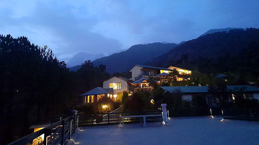 Night falls over Rakkh Resort with the inky blue Shivalik range in the background
