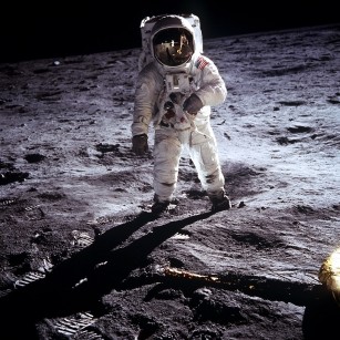 Buzz Aldrin, lunar module pilot, walks on the surface of the Moon near the leg of the Lunar Module "Eagle" photographed by Neil Armstrong