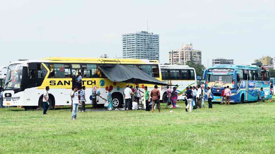 Buses parked on the Maidan on Thursday. The high court has banned parking on the Maidan. 