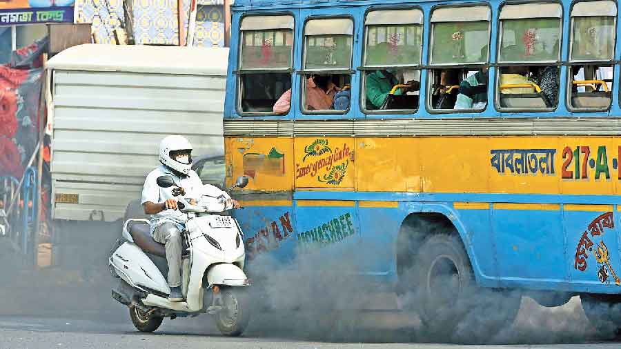 A smoke-belching bus causes air pollution