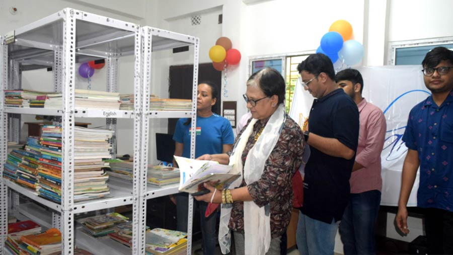 Actor Sudeshna Roy skims through a book at the library.