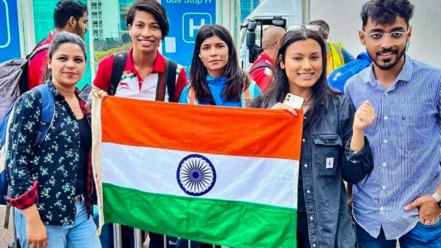 Boxers Lovlina Borgohain and Nikhat Zareen with fans upon their arrival for the CWG 2022