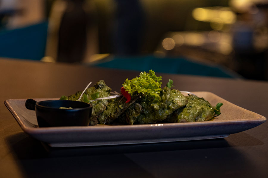 The Oven Baked Pesto Bhekti is a guest favourite. Delicate slices of fish marinated in a mix of basil, garlic and parmesan, then dressed in olive oil and baked