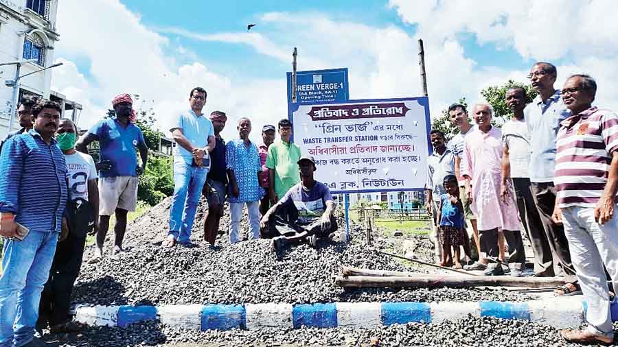Residents of AA Block in New Town demonstrate against the construction of a waste transfer station in a green verge.