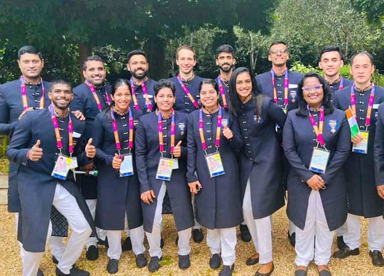 PV Sindhu (third from right) with members of the badminton contingent and support staff ahead of the opening ceremony of the Birmingham Commonwealth Games on Thursday.