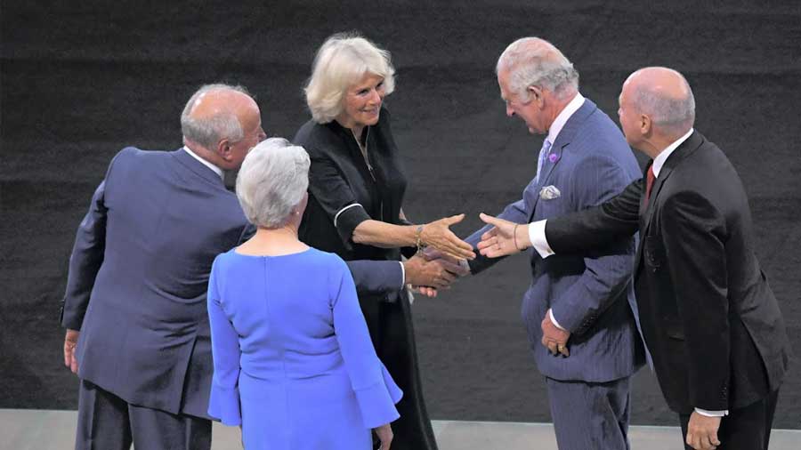 Prince Charles and Camilla, Duchess of Cornwall, arrive to attend the opening ceremony 