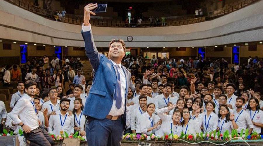 Founder of MEPL Mohit Agarwal clicks a groupfie at the programme.