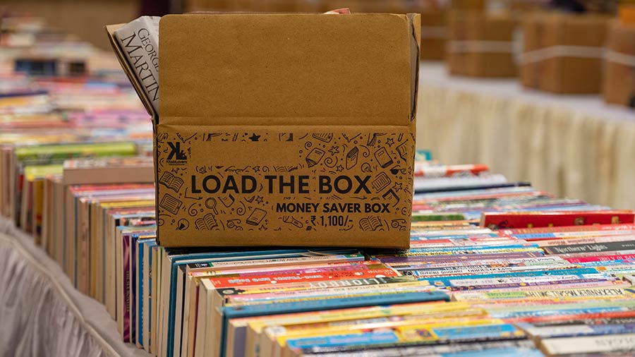 Bookworms can fill their boxes with books at this book fair. 