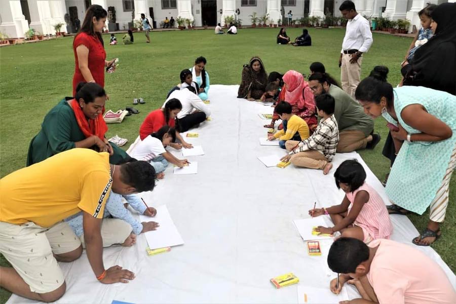 Children take part in a National Flag drawing competition to celebrate the 23rd Kargil Vijay Diwas at the Indian Museum courtyard on Tuesday, July 26, marking India’s victory over Pakistan. The bravery, courage and sacrifice made by the Indian armed forces is observed on that day. 