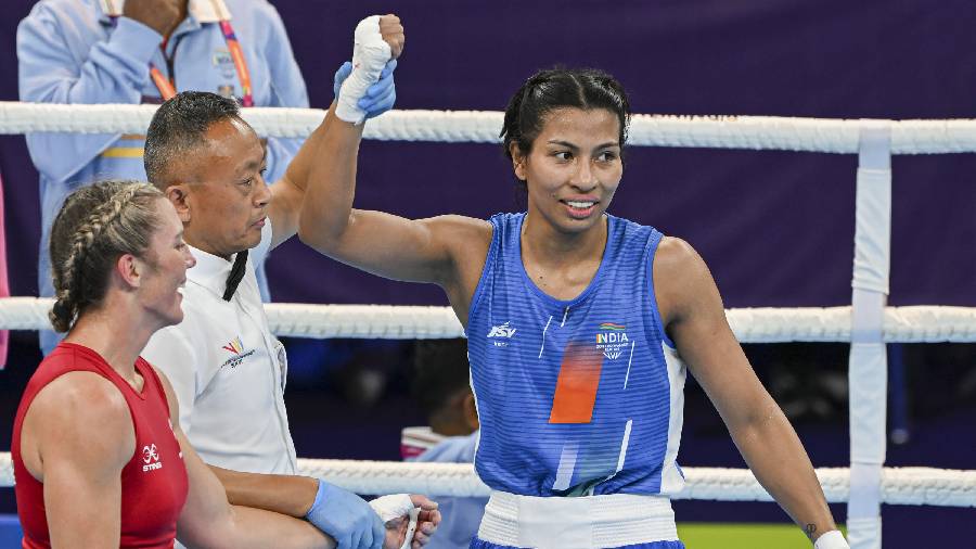 India's Lovlina Borgohain (Blue) after her win against Ariane Nicholson (Red) of New Zealand during the women's 66-70kg (light middleweight) boxing match of the Commonwealth Games 2022