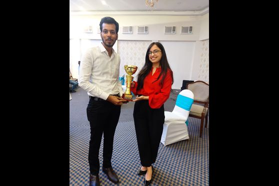Heritage Business School Kolkata team with the winner's trophy of the Eastern Regional Debate 2022