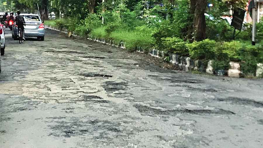 Crater-filled roads in the township