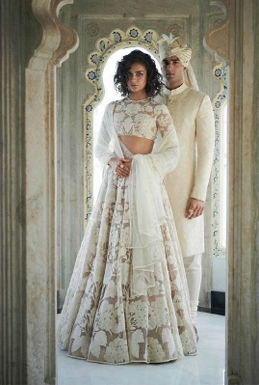 A new-wave Lehenga: Sabyasachi’s new White Wedding meshes desi styling with western influences with hand-dyed tulle saris and lehengas and embroidered veils. Explore new-age silhouettes in silk or jamdani weaves and festive accents 