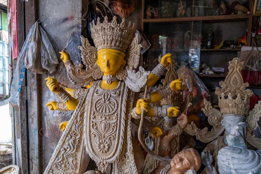 Another prominent idolmaker, Raja Pal, is putting the finishing touches to an idol (above) to be sent to Texas. “The idols we export aren’t made of mud, like the ones we see in Kolkata. These idols are made of fibre, because it’s lighter, lowers the transportation cost and makes it easier to move,” he says, adding that fibre protimas also last for years, and many committees abroad prefer to use the same protima again