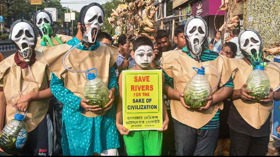 People with disabilities participate in an awareness campaign to protect the rivers, on the eve of World Environment Day in Calcutta