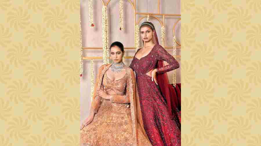 For the wedding occasions, Meghna sported a subtle-glam look in the champagne lehnga featuring crystal work in a unique pattern, paired with a studded blouse and an embroidered dupatta. Ankita complemented the frame in the glamorous wine-colour gown embellished with sequins.