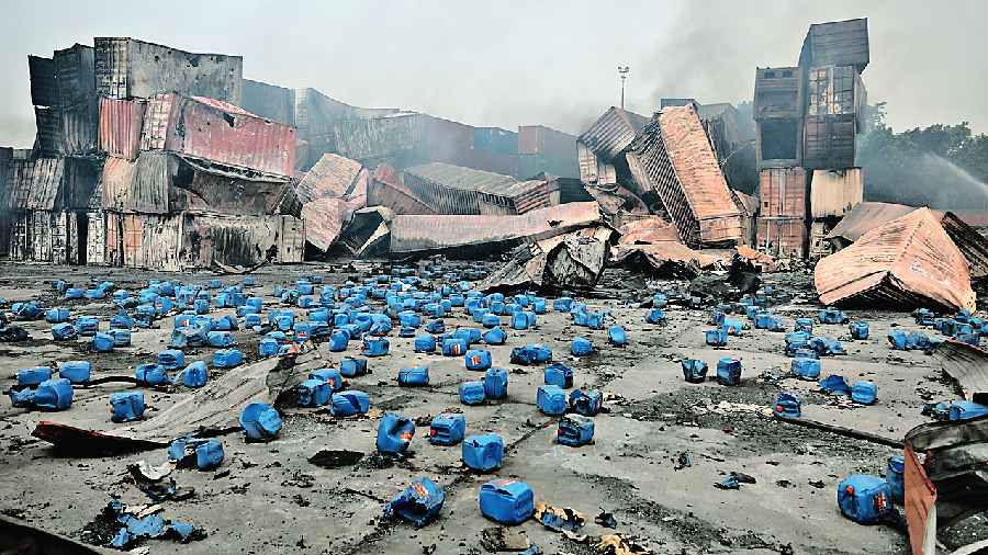 Chemical containers lie scattered on Monday after the explosion at the BM Inland Container Depot, resulting in a fire that started on Saturday in Chittagong, 210km southeast of Dhaka. 