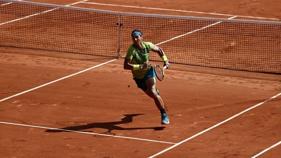 Nadal chasing a lob played by Ruud in the final