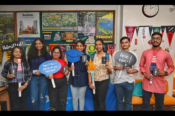 Students pose for a quick photo session during the Students Visa Day at the American Center, Kolkata  