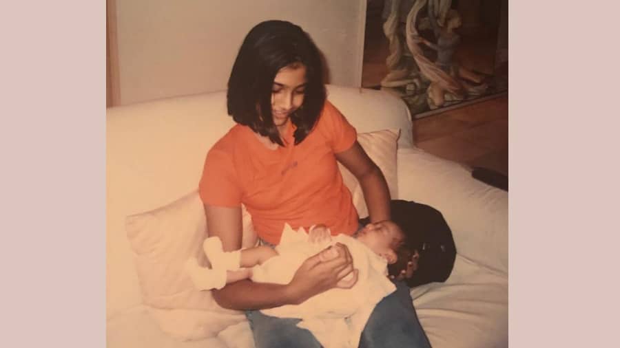 Little Janhvi Kapoor on big sister Sonam’s lap.