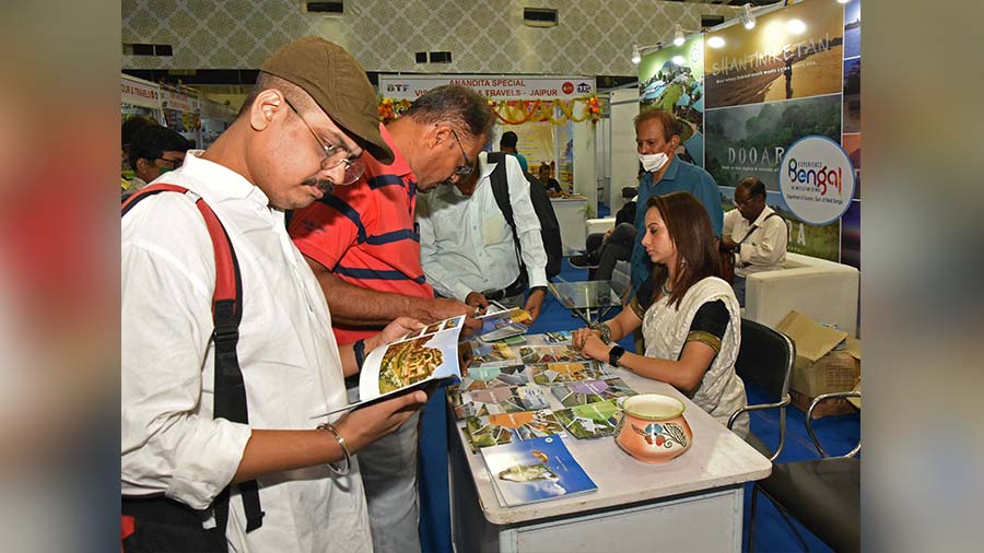 Visitors at a tourism stall set up as part of Tourism Fest 2022 at Khudiram Anushilan Kendra on Friday