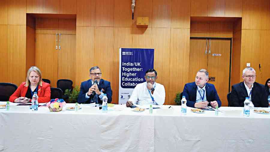 Father Dominic Savio (centre), principal, St Xavier’s College,  during an interactive session with educationists from UK  on Thursday. 