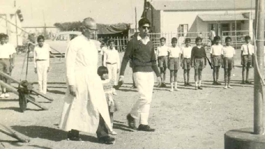 WIZARD OZ: Father John Leonard Moore with Rohinton Kapadia at St. Xavier’s School in Bokaro. 