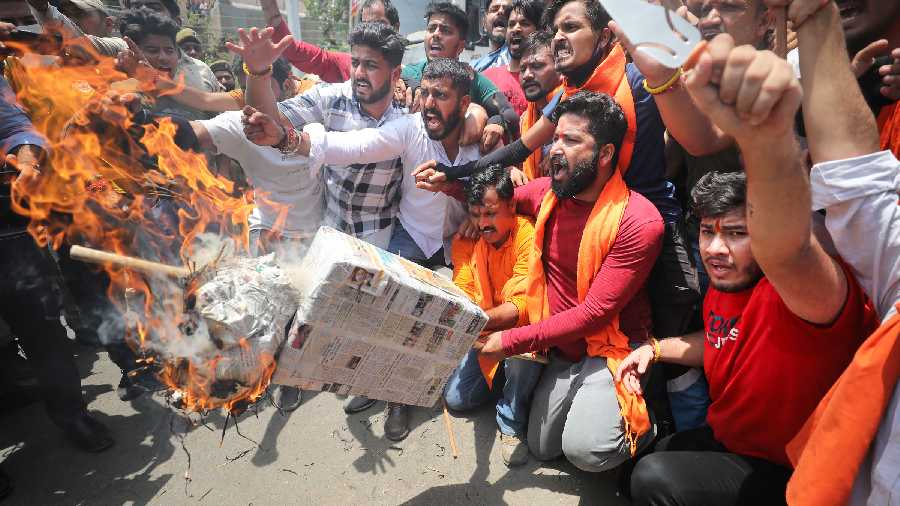 Bajrang Dal activists stage a protest, a day after clashes in Bhaderwah in Jammu
