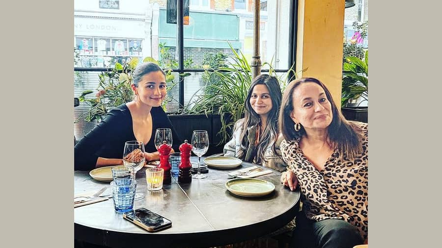 Soni Razdan’s photo with daughters Alia and Shaheen Bhatt, catching up on lunch in London is all things hearts on the internet.
