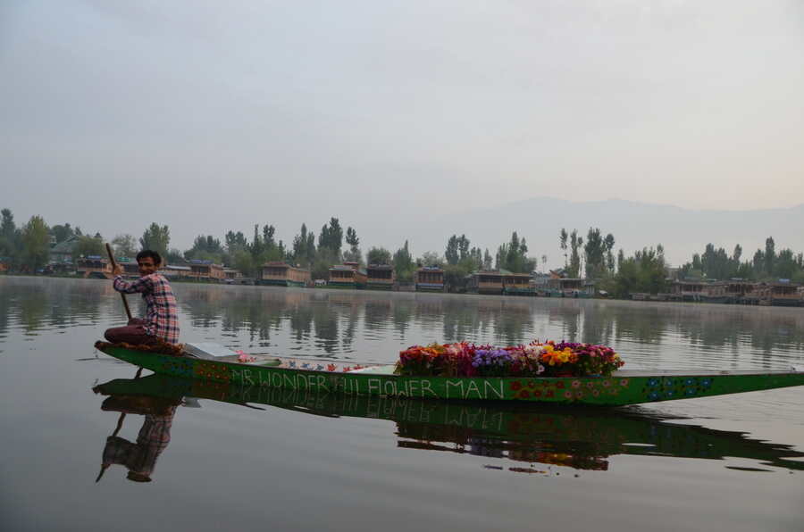 Morning rush: On an early morning shikara ride on the Dal, you will be greeted by many a ‘Mr Wonderful Flower Man’ with their bouquets of colourful blooms