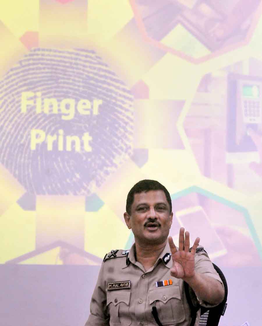 West Bengal director general of police Manoj Malaviya speaks during an event on the 125th anniversary of Finger Print Bureau at Bhabani Bhawan on Monday