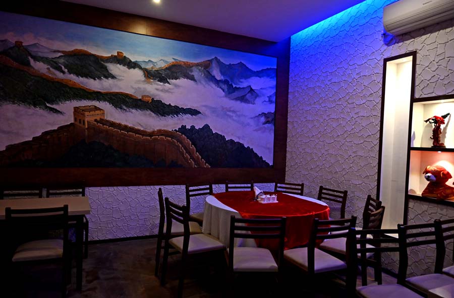 The dimly lit corner of the restaurant can be an ideal spot for a romantic dining experience.