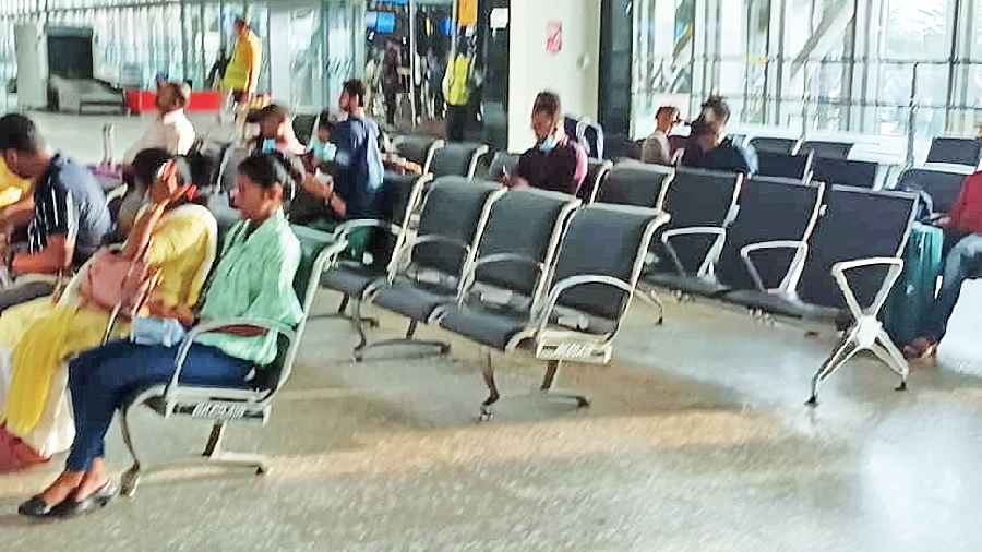 Passengers without masks in the departure  area of the Kolkata airport