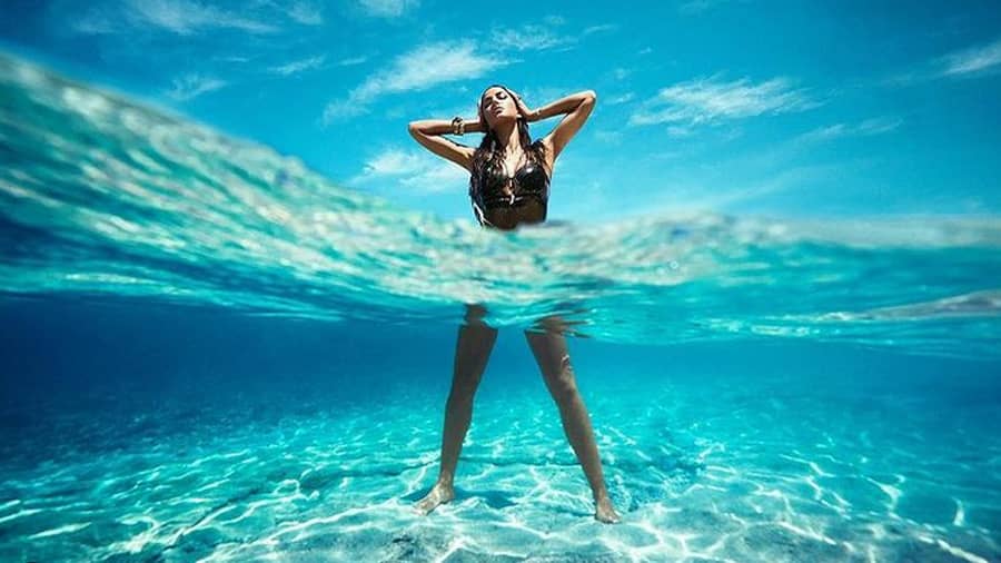 Katrina Kaif: Water on fire! Katrina sizzles in this black number as the blue waters lend the perfect backdrop. We can’t take our eyes off this one.