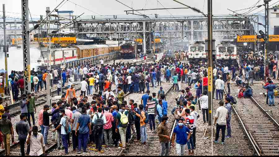 A mob vandalises trains and railway properties at the Secunderabad Railway Station in protest against the Central government’s ‘Agnipath’ scheme, near Hyderabad