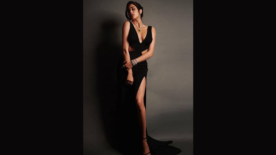 Janhvi Kapoor: Janhvi set the internet on fire with her thigh slit plunging neckline number. The fashionista completed her look with a diamond necklace and nude makeup, focusing more on her telling eyes.