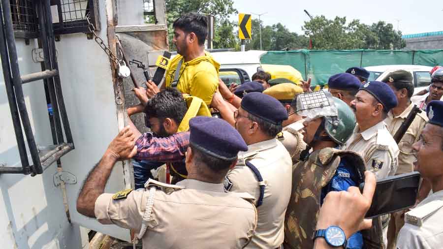 Policemen lathi-charge protesters at Chadwal in Kathua district on Saturday.