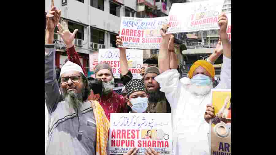 Muslim activists protest against the suspended BJP leader and spokesperson, Nupur Sharma, in Mumbai, June 2022.
