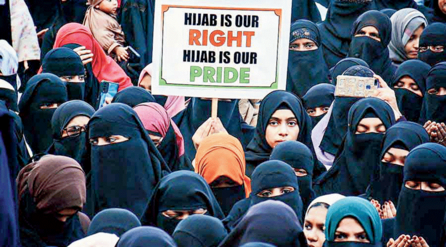 Muslim girls protest against hijab ban.