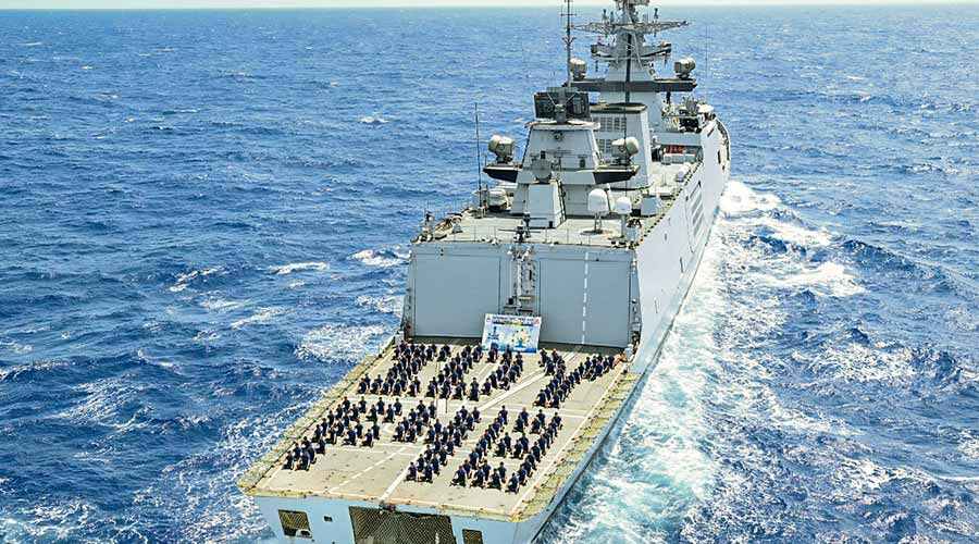 Navy personnel perform yoga to celebrate 8th International Day of Yoga, onboard INS Satpura, operating near the International Dateline in the middle of the Pacific Ocean on Tuesday. The ship is presently about 7000 Nautical Miles from her base port Visakhapatnam