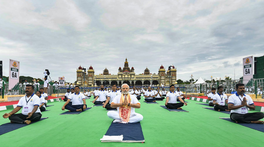 Prime Minister Narendra Modi performs yoga at the main event of the eighth edition of the International Day of Yoga, in the heritage city of Mysuru, Karnataka