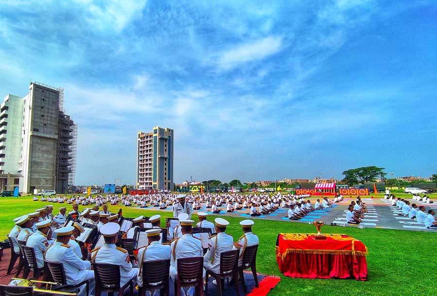 A band plays music while Border Security personnel perform yoga on Tuesday.