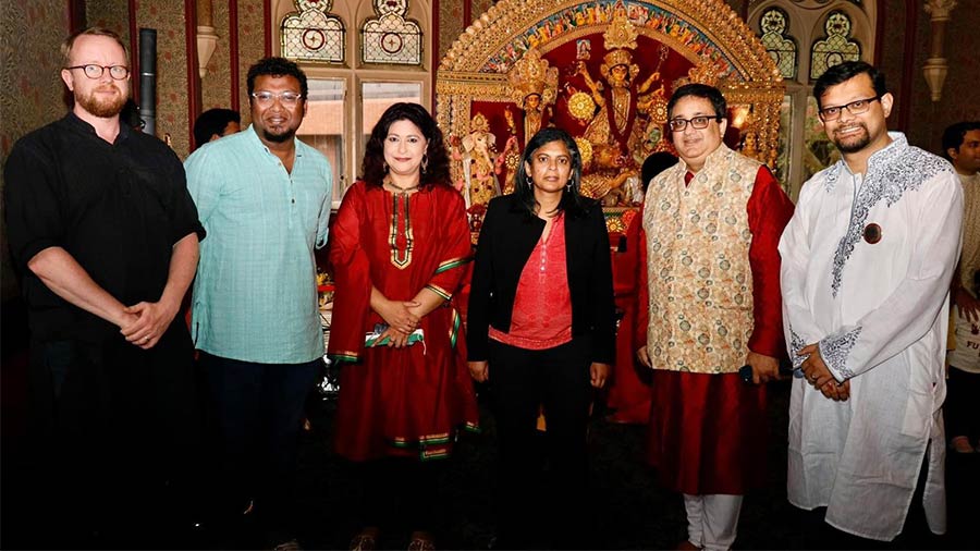 Rohit with British MP Rupa Huq (fourth from left) at a Durga Puja in Ealing, London 