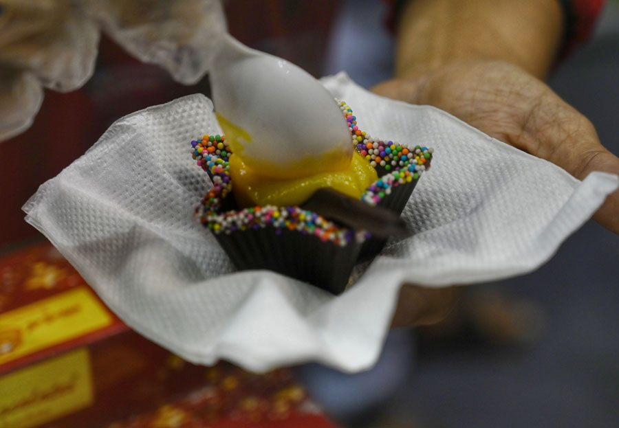 Different varieties of sweetmeats and savouries prepared from mango were on display at the festival. 