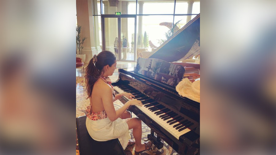 Friday brunch: A backless floral number teamed with a monochrome asymmetric skirt is the right amount of oomph to welcome the weekend.